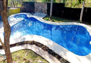 CASA EN VENTA EN LAGUNAS DE TORREMOLINOS — Casa vacacional en Venta en Lagunas de Torremolinos, Escuintla, Escuintla — miniatura 1 de 11