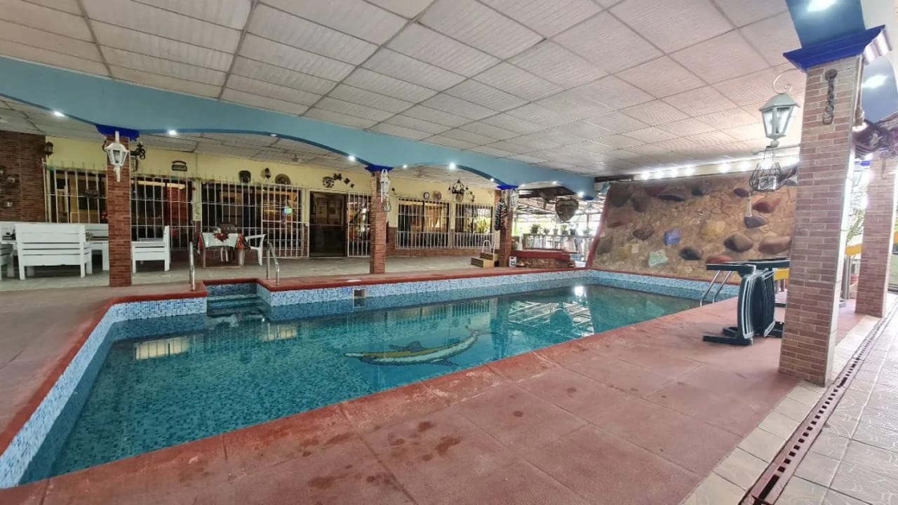 CASA VACACIONAL EN VENTA EN QUINTAS LA PONDEROSA, KM 77 HACIA PUERTO QUETZAL — Casa en Venta en Quintas La Ponderosa, Escuintla, Escuintla — foto 14 de 15