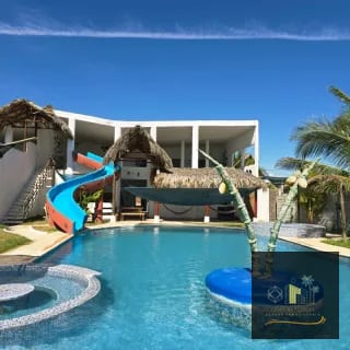 CHALET EN VENTA FRENTE AL MAR EN MONTERRICO — Casa vacacional en Venta en Monterrico, Santa Rosa — miniatura 1 de 14